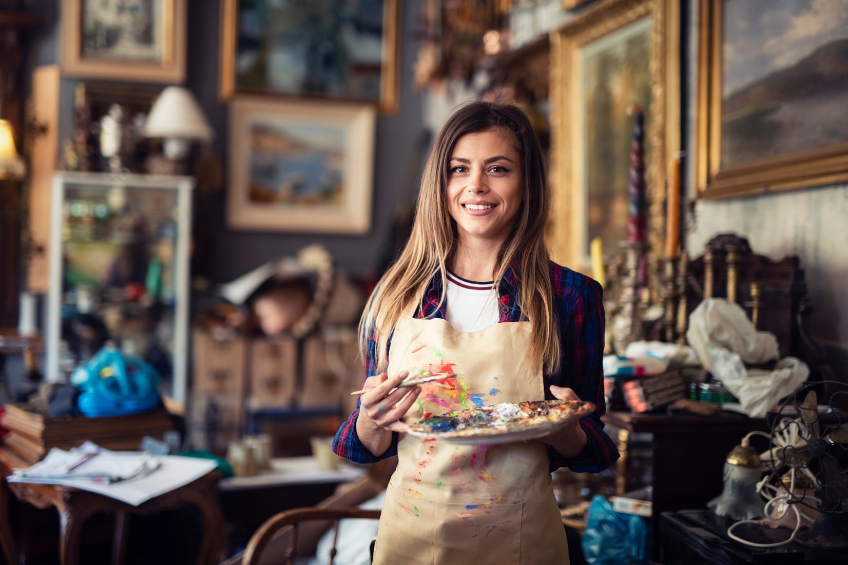 Portrait of young artist woman painter.